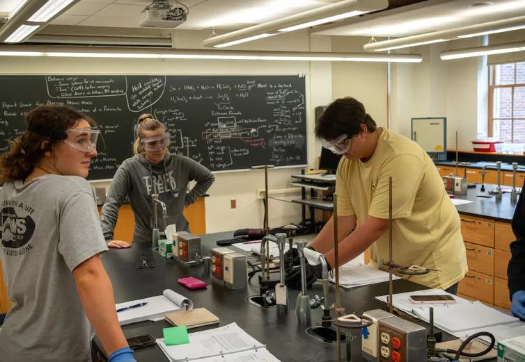 Marietta College students working in a chemistry lab.