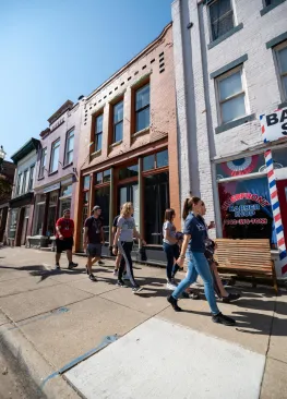 Marietta College students walking down the sidewalk on Front Street