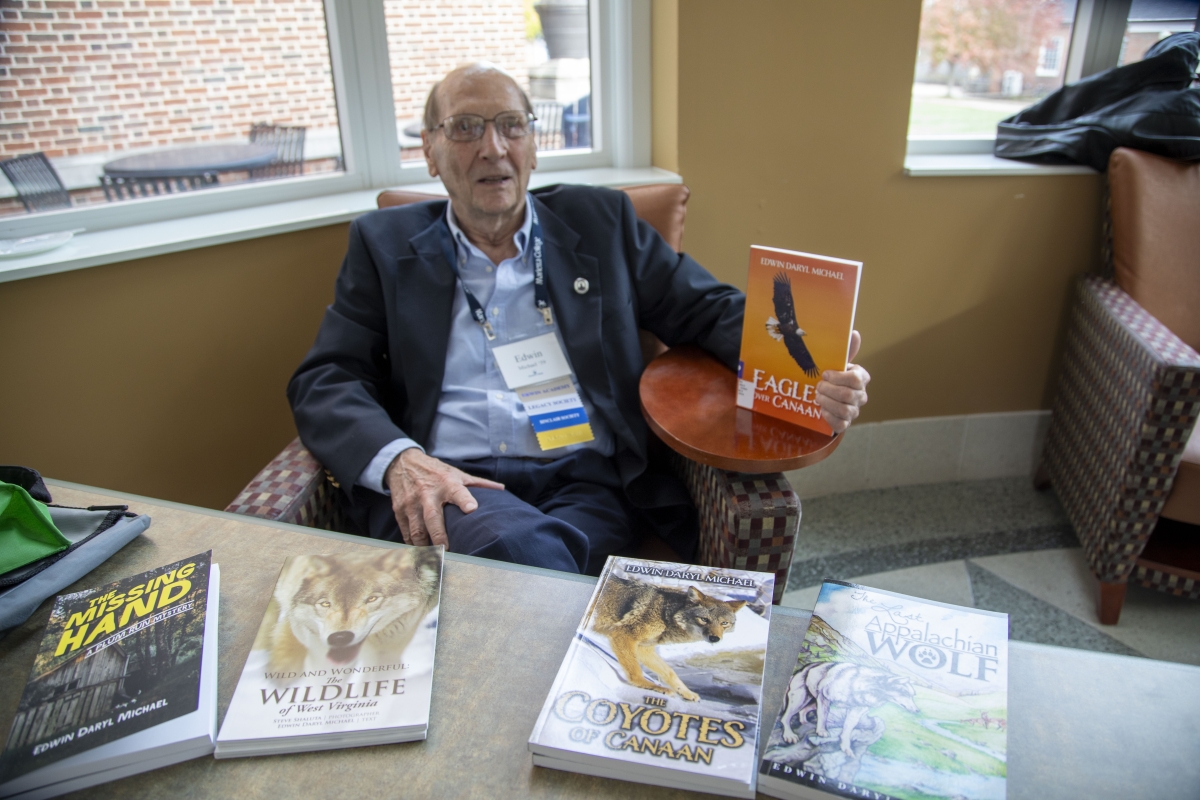 Edwin Michael â59 showcases his books.