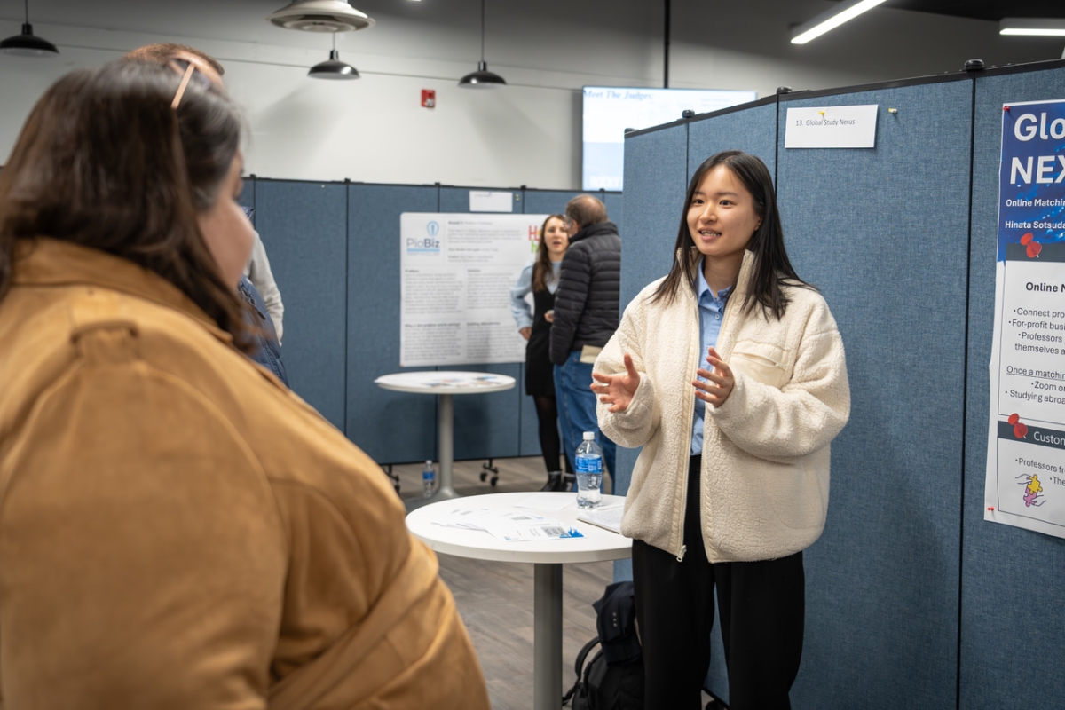 Hinata Sotsuda presents at PioBiz Round 1 Competition