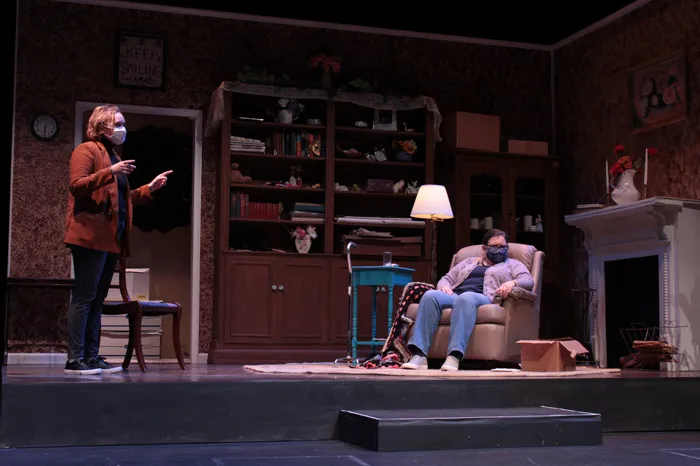 Two women rehearsing on stage