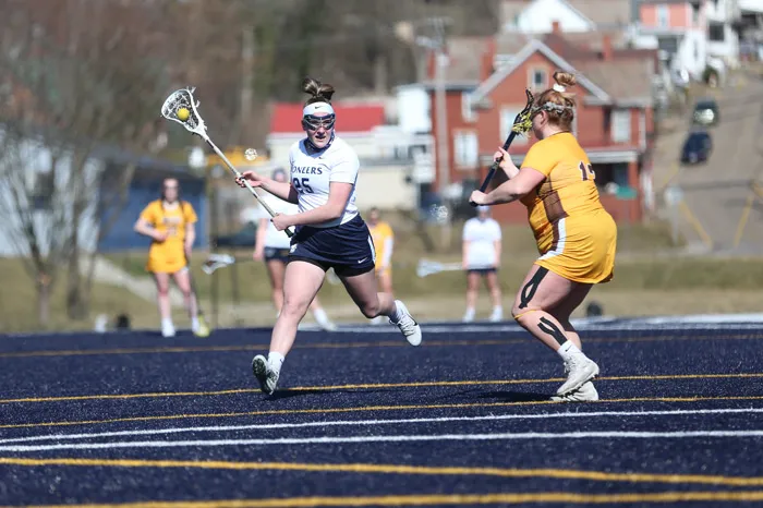 Women's lacrosse player looks to score