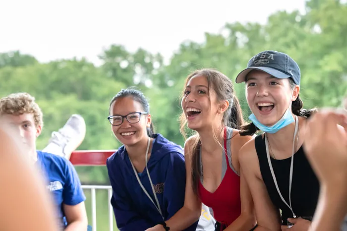 Three female students laughing