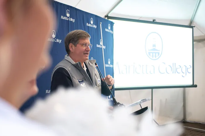 President Ruud speaking from a podium