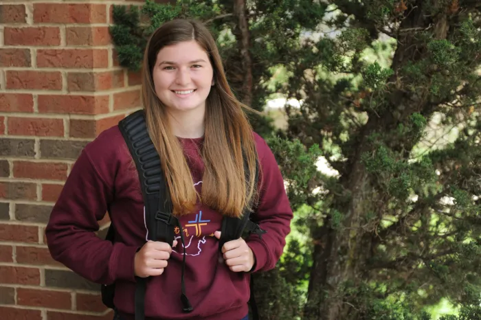 Allison Loase in front of a tree