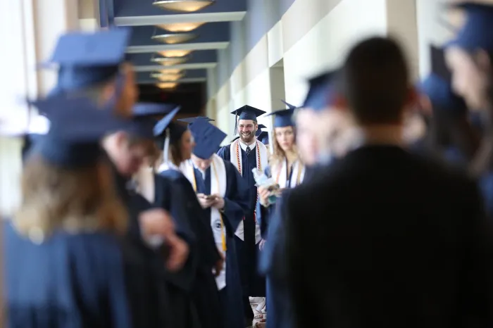 MC Graduates in robes