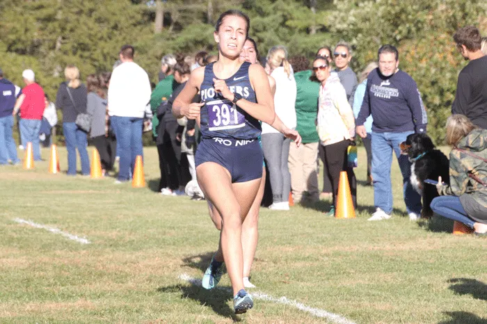 Student-athlete running away from the competition