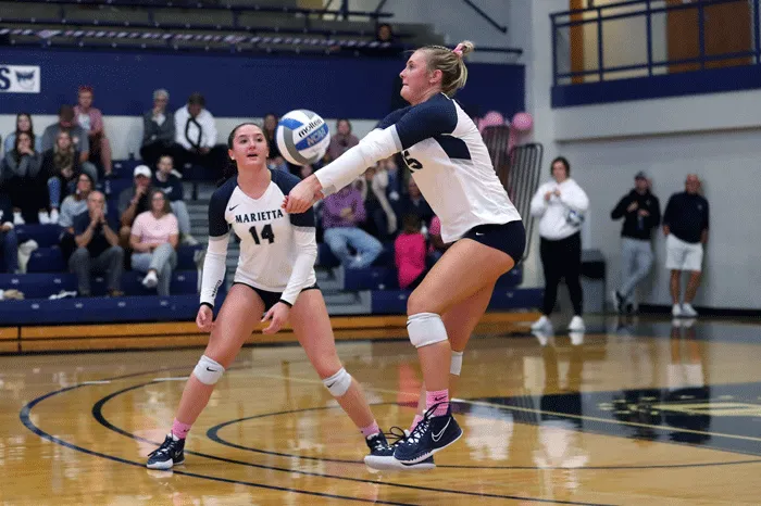 Volleyball player returning a serve