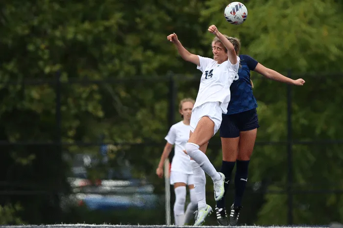 Marietta soccer player hitting the ball with her head