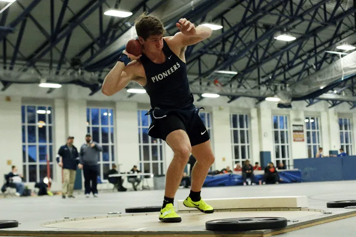 Athlete throwing the shot put