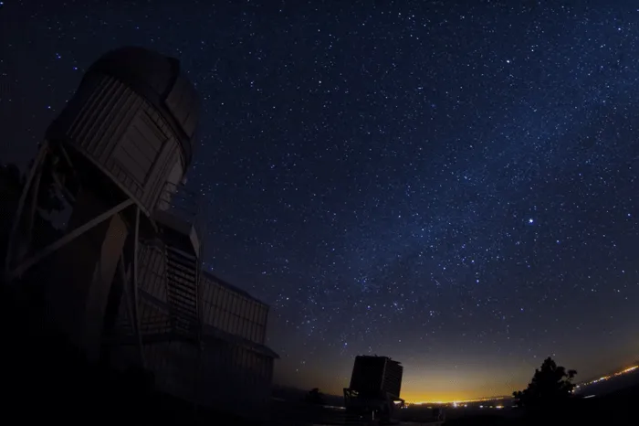 Observatory with a night sky