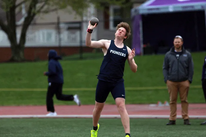 Athlete throwing the shot put