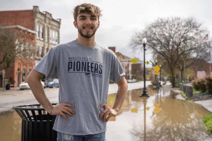 Colin Campagne standing in downtown Marietta