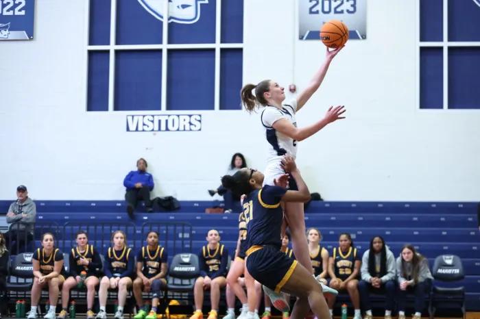 Basketball player making a lay-up