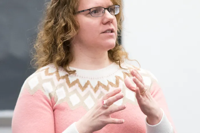 Katy McDaniel speaking with students