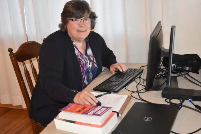 Professor Bev Hogue teaching class remotely from her home