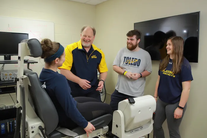 Dr. Chris Ingersoll ’85 with students at the University of Toledo