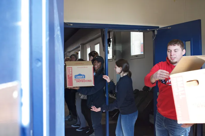 Students loading boxes on MLK Day of Service