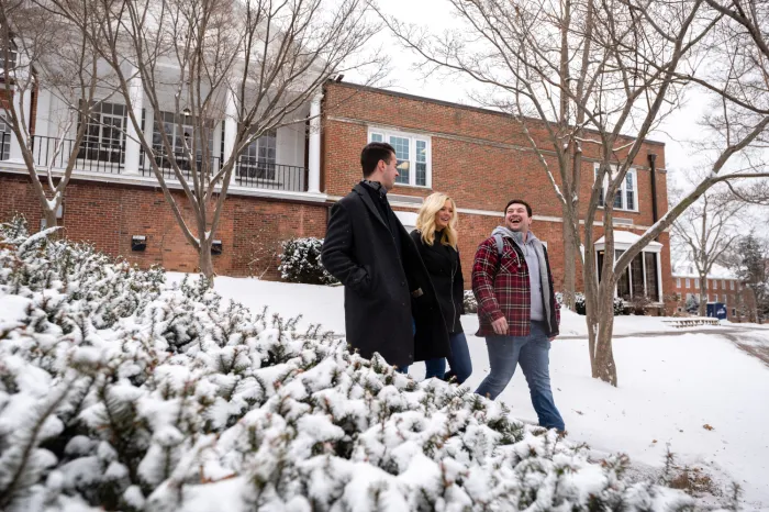 Students walking on a snowy campus