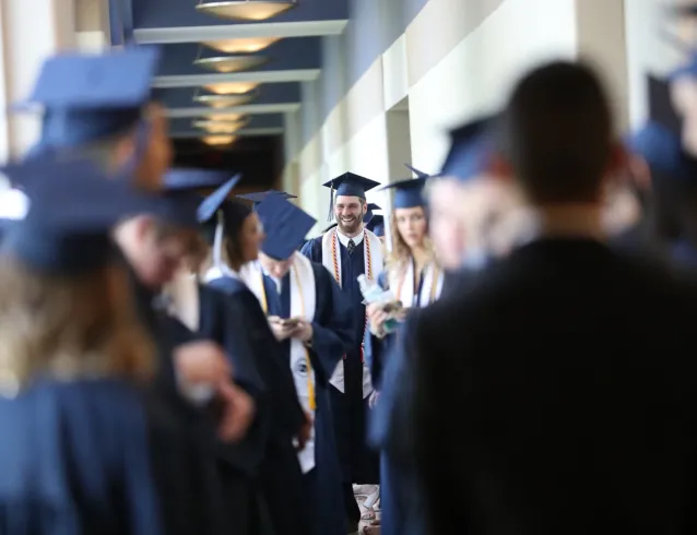 MC Graduates in robes