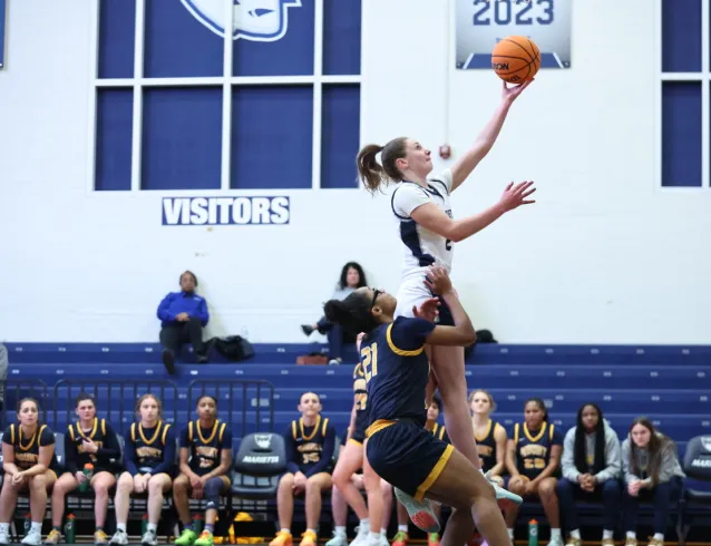 Basketball player making a lay-up