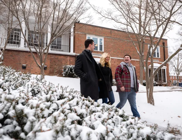 Students walking on a snowy campus