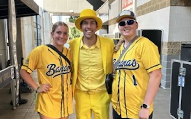 pictured are sophomores Emily Grant (left) and Adi Heath (right) with Savannah Bananas co-owner Jesse Cole