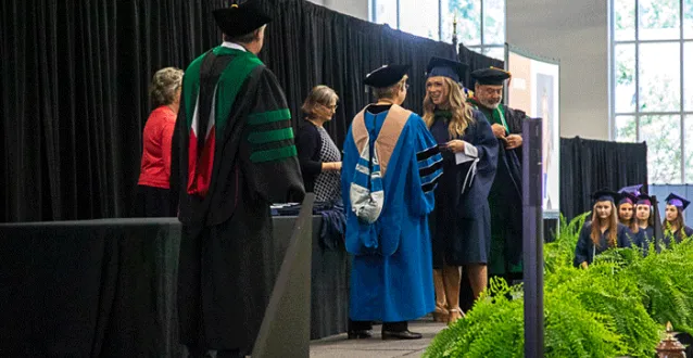 PA student receiving diploma