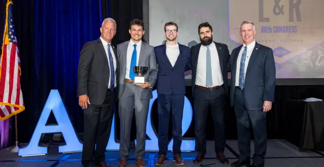 Zack Riffle and Serj Wahl represent Marietta College's Alpha Tau Omega chapter during the 2024 Biennial Alpha Tau Omega Congress to receive the True Merit Award