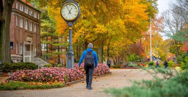 Student walking on Marietta College's Mall