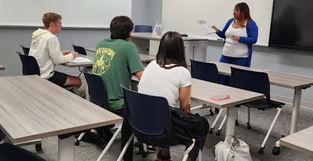 Kimberly Mason speaks to students in a classroom