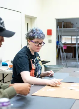 A student participating in a Studio Art class