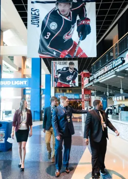 Marietta College Sport Management majors works during a Columbus Blue Jackets game as part of a job shadow.