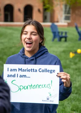 Student speaking in front of a camera