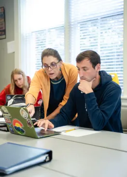 A Marietta College Education instructor works with a student