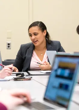 A Marietta College Fifth Stree Consulting student speaks to classmates