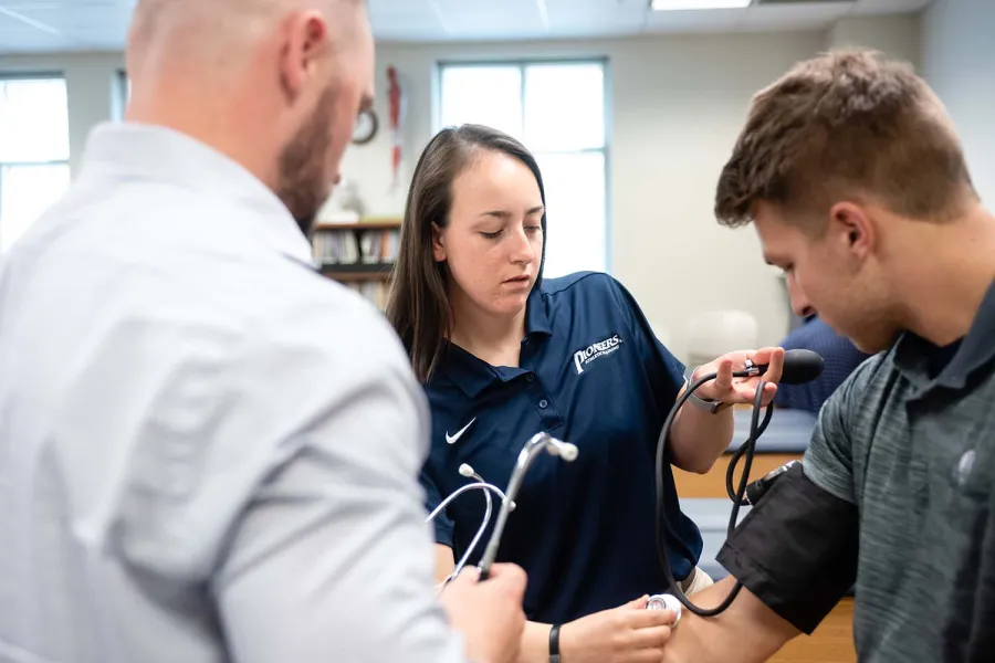 Lauren Redfern of Marietta College taking a medical reading